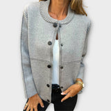 Elegantne kardigan diskreetsete detailidega