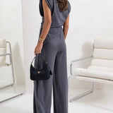 Brigitte - Ebakorrapärase ülaosa ja laiade pükste komplekt